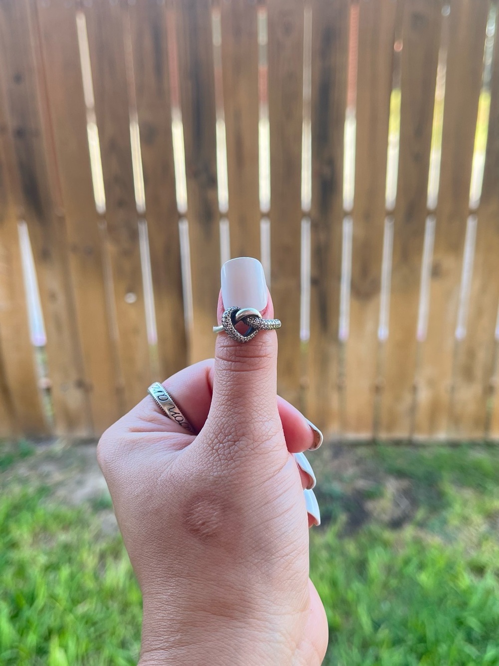 Pandora Silver Heart Knot Ring with Black Center